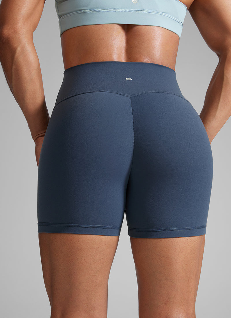 טייץ מחטב+ קצר עם כיווץ בישבן 4" Butterlift Secretsculpt™ ללא תפר קדמי - Stelindigo